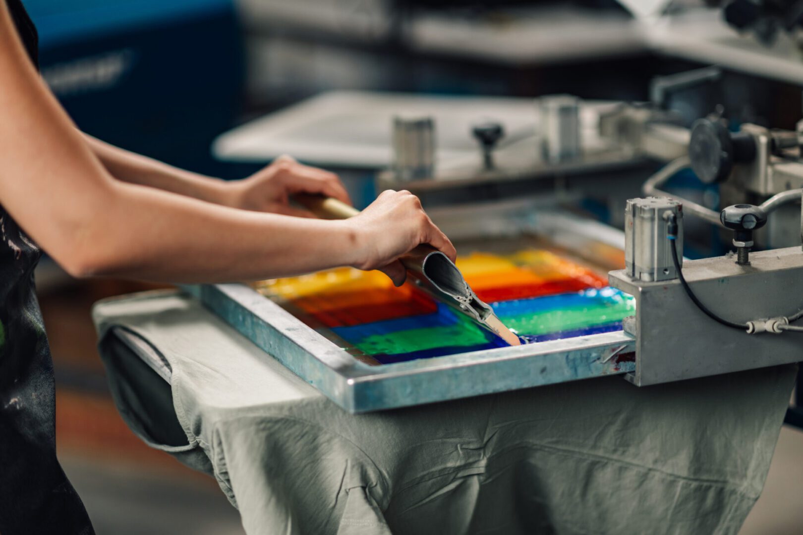Screen printing colorful design on fabric